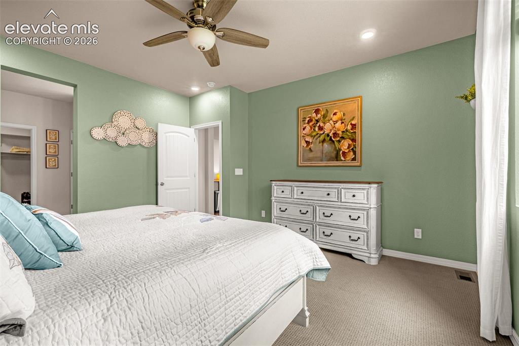 Image 17 of 40: Ceiling fan with integrated lighting, recessed lighting, carpet flooring, i