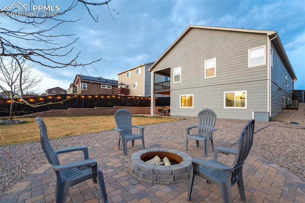 Image 5 of 46: Firepit and Privacy