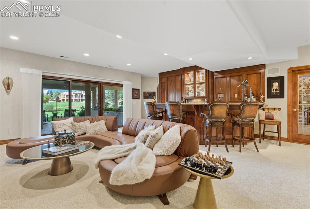 Image 37 of 50: custom wet bar in clear Alder in the background