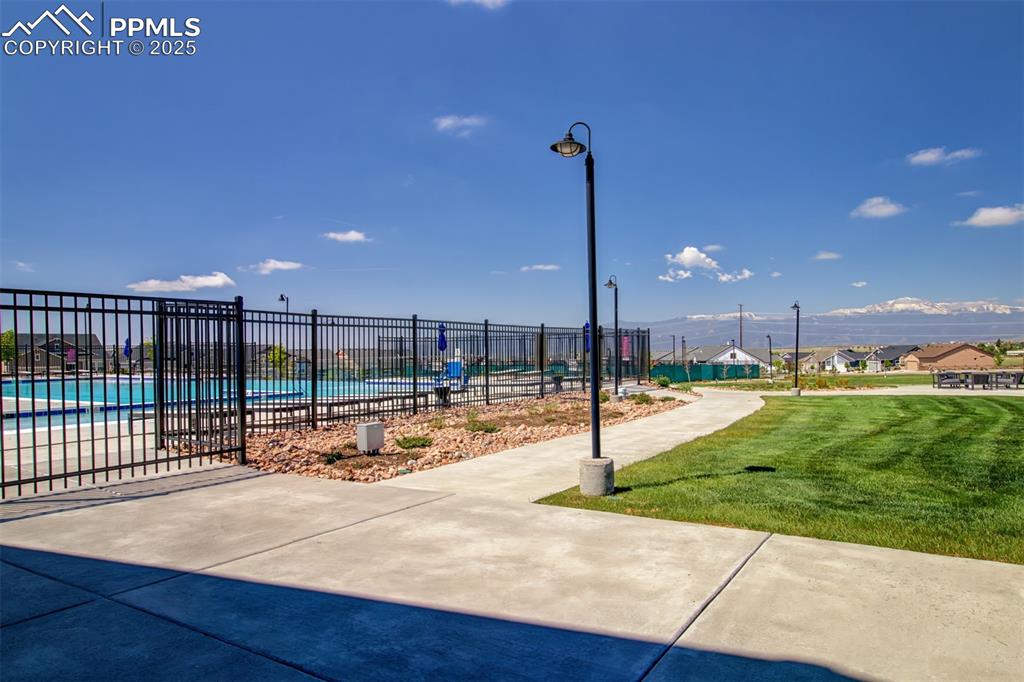 Image 38 of 39: Beautiful Outdoor pool and Hot Tub.