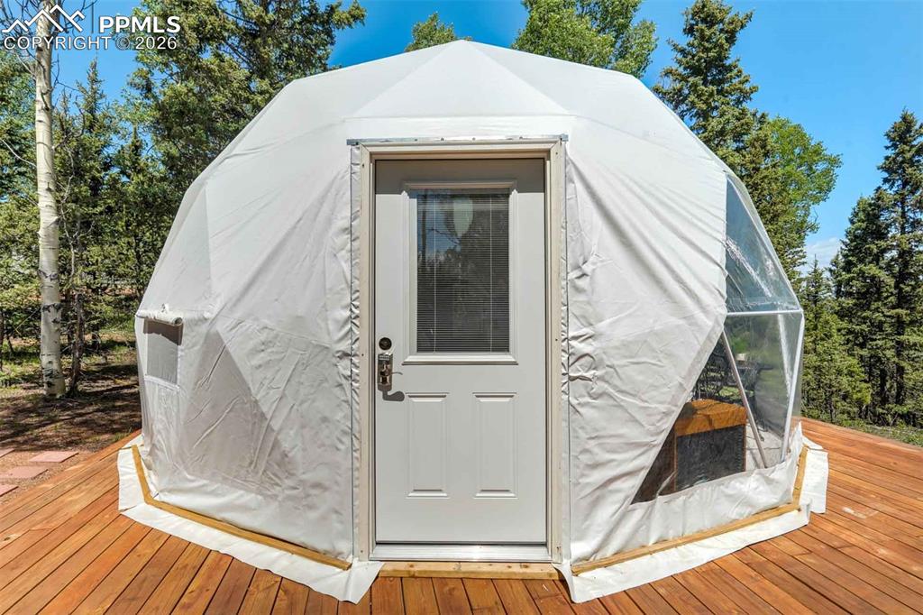 Image 24 of 42: Bubble tent negotiable and  is a wood deck and fully furnished.