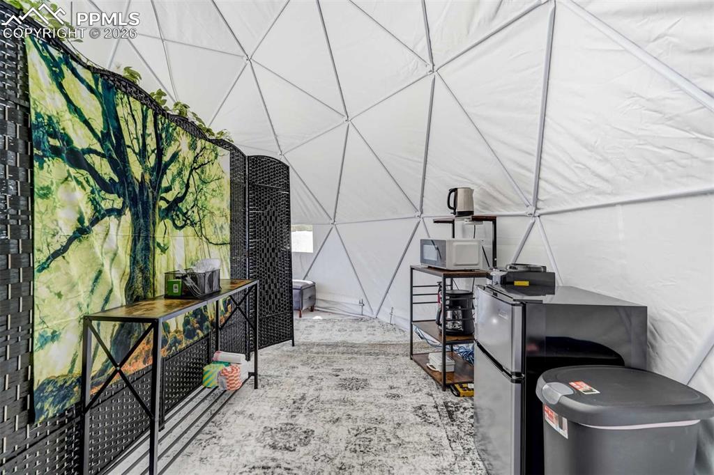 Image 26 of 42: Bubble tent negotiable and  is a wood deck and fully furnished.