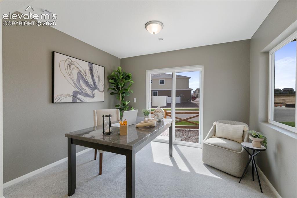 Image 3 of 20: Spacious room featuring neutral paint tones, recessed lighting, and soft ca