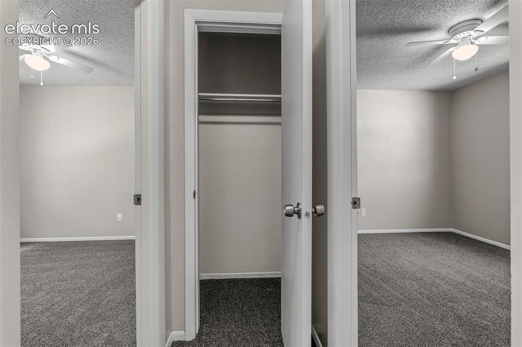 Image 25 of 47: Hall Linen Closet and Looking into Bedroom 2 and 3