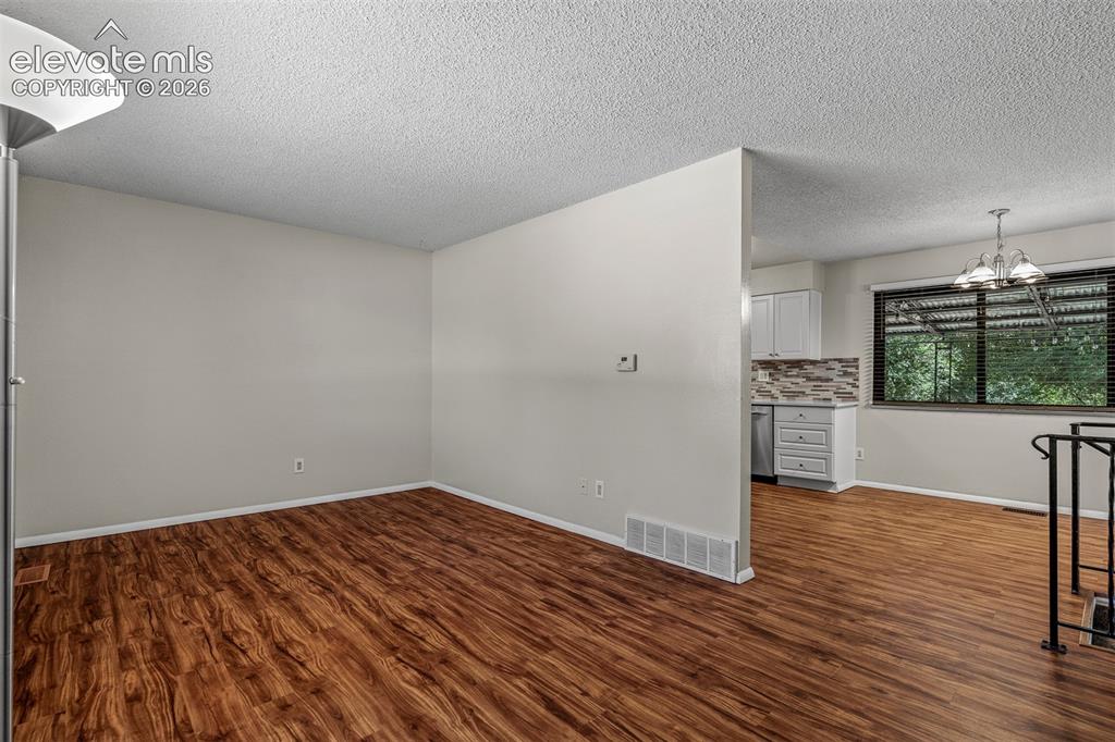 Image 3 of 47: Looking into Dining Area and Kitchen