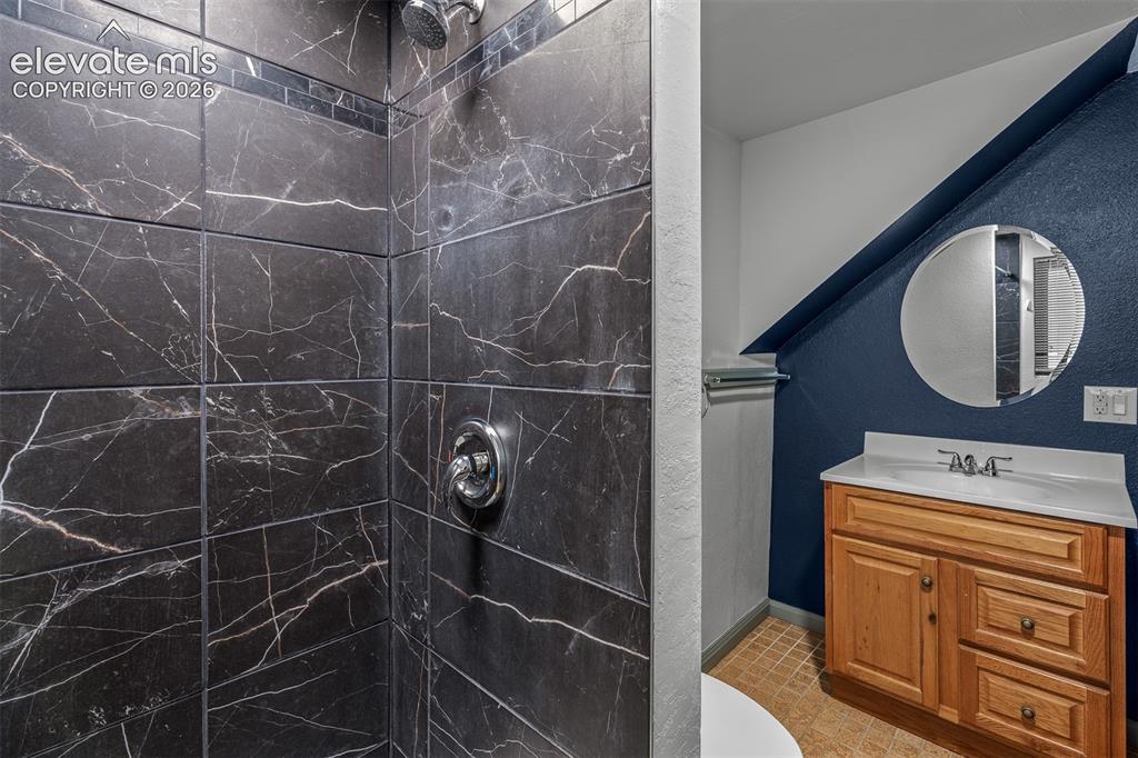 Image 33 of 47: Lower-Level Bath
