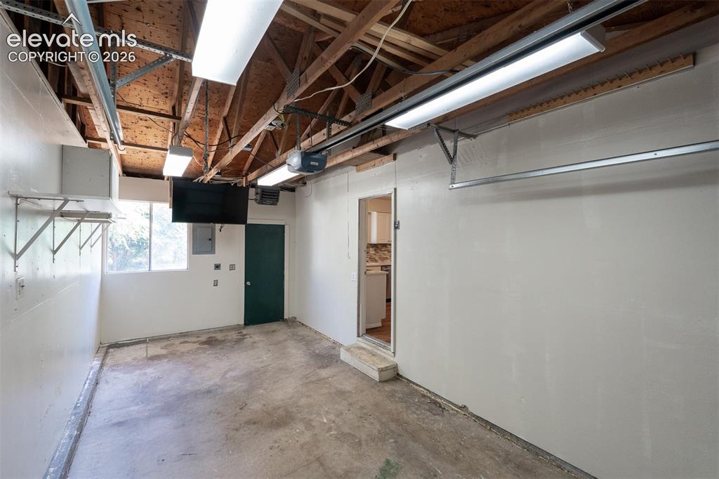Image 40 of 47: Heated Garage with a TV