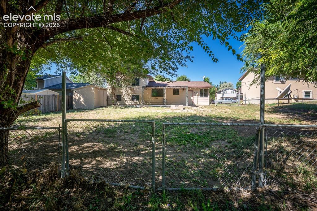 Image 45 of 47: Rear Spacious Back Yard With Parking And A Gate