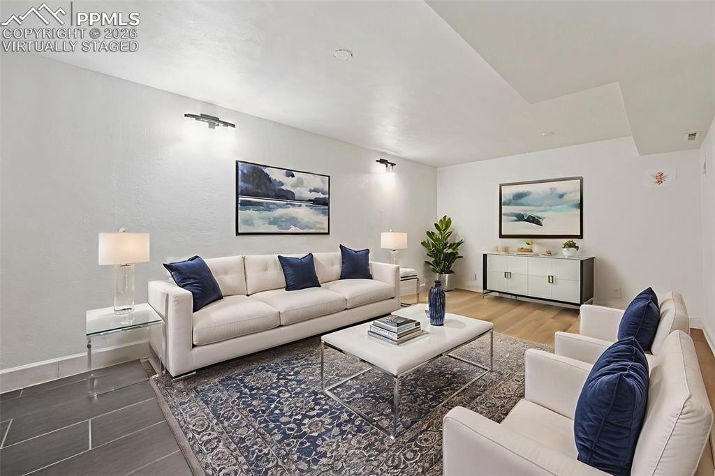 Image 17 of 30: basement/bonus family room (virtually staged)