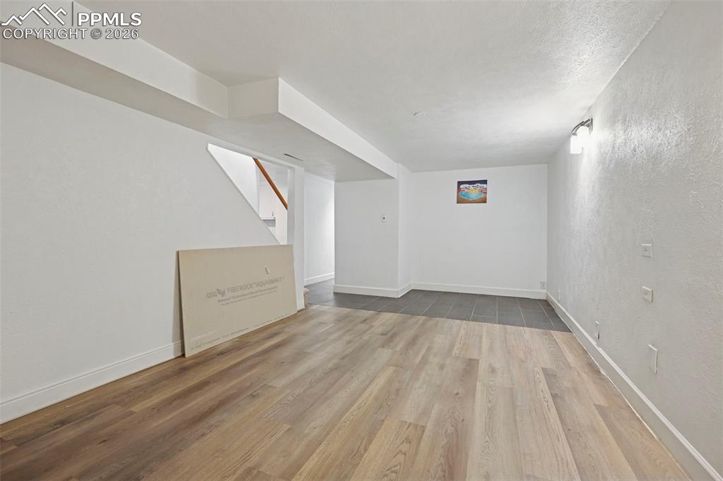 Image 19 of 30: BASEMENT/BONUS FAMILY ROOM