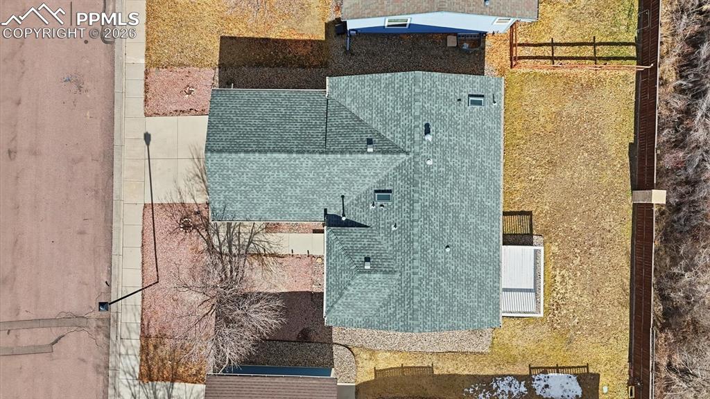 Image 34 of 37: Aerial view of home and lot.