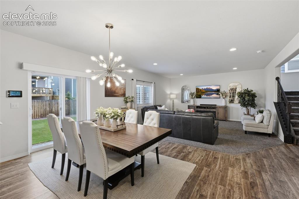 Image 12 of 42: Open concept to living room
