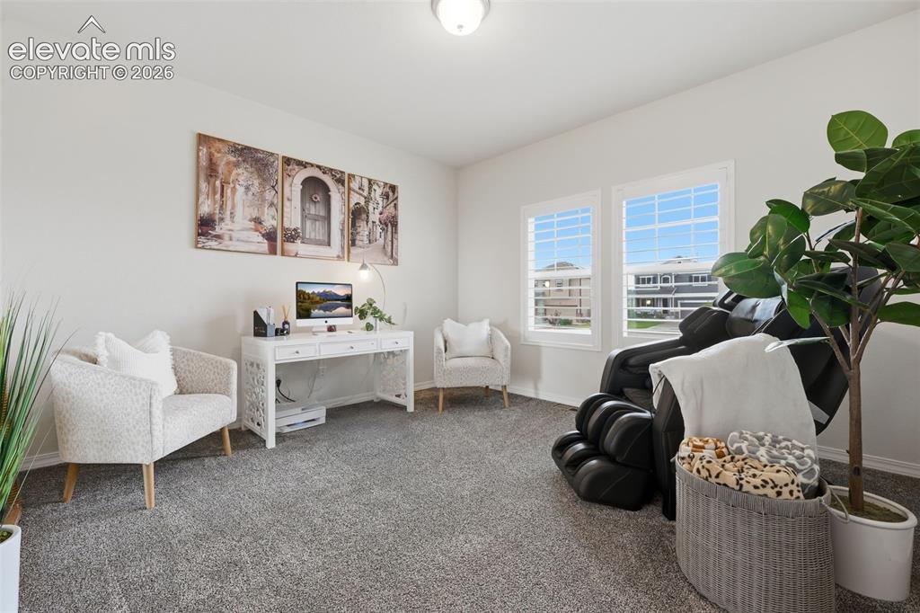 Image 16 of 42: Large office with french doors