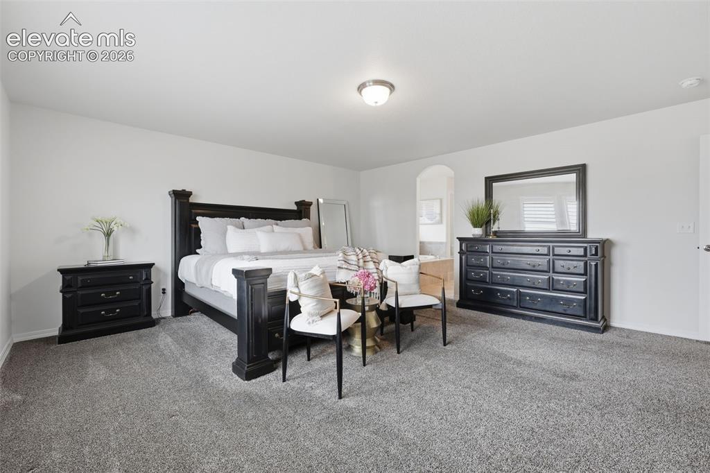 Image 18 of 42: Huge master bedroom with en suite bathroom