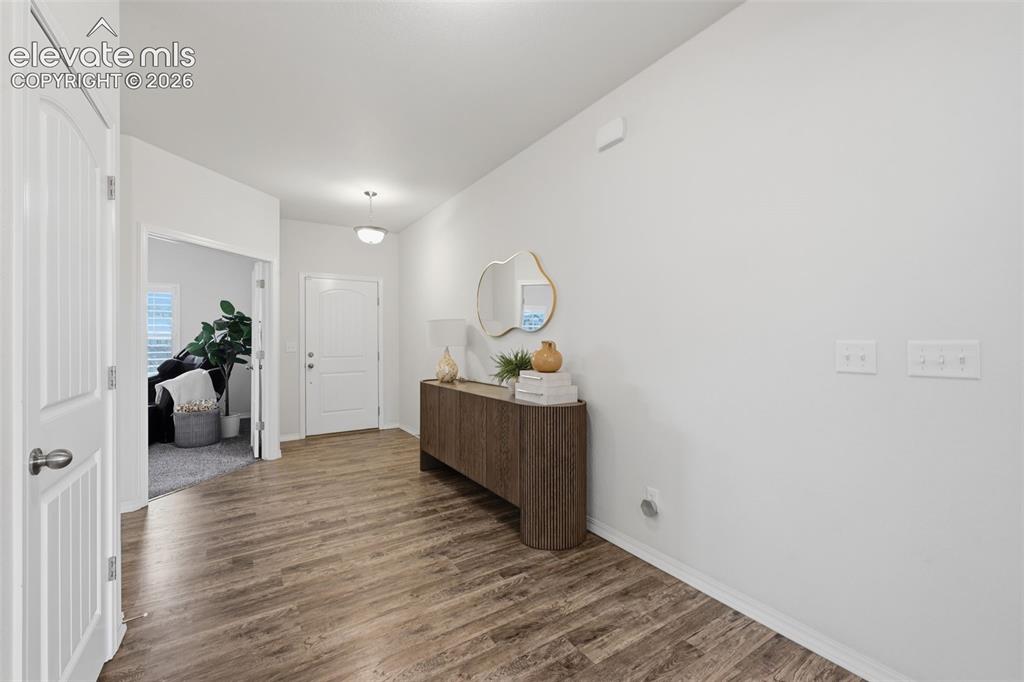 Image 5 of 42: Open to office and powder bath