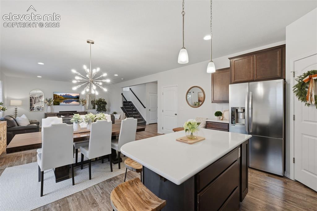 Image 8 of 42: Quartz countertops and center island