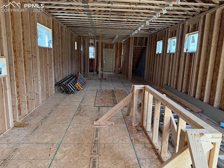 Image 12 of 20: Kitchen looking towards the Dining and Great Room. Please, excuse our dust