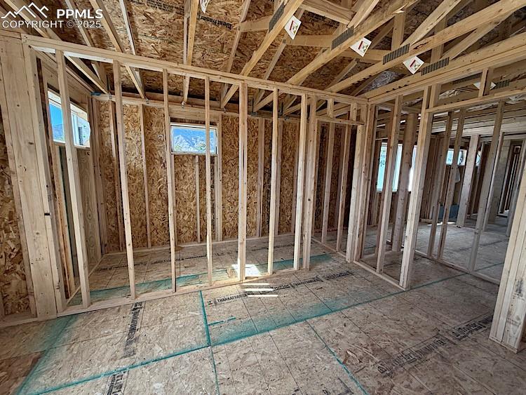 Image 15 of 20: Primary Bedroom and Walk-in Closet. Please, excuse our dust as this home i
