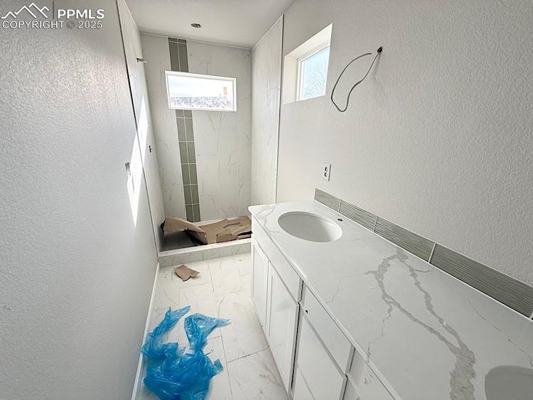 Image 21 of 36: Primary Bathroom. Please, excuse our dust as this home is currently under c