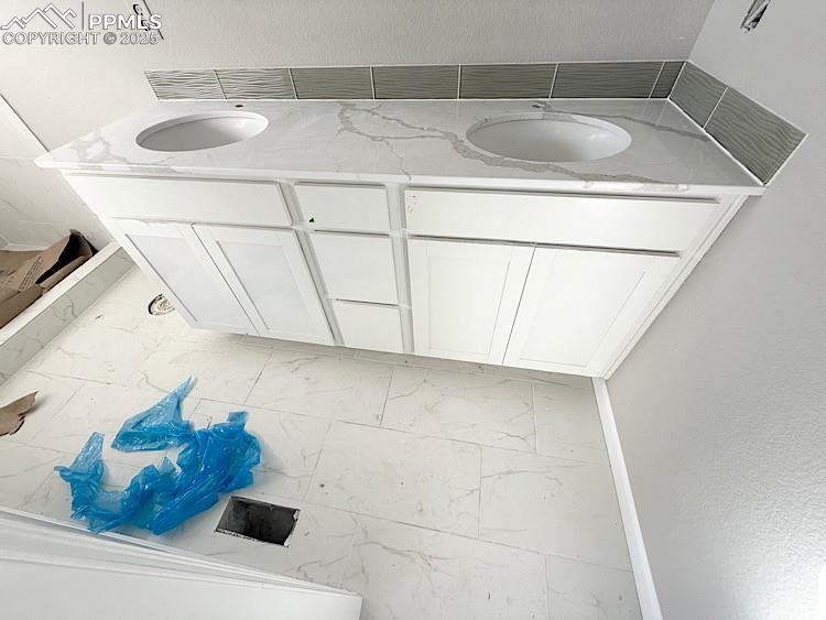 Image 22 of 36: Primary Bathroom. Please, excuse our dust as this home is currently under c