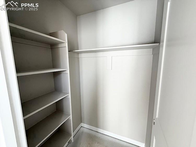 Image 25 of 36: Bedroom 2 Closet.  Please, excuse our dust as this home is currently under 