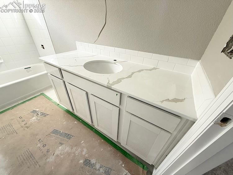 Image 28 of 36: Full Bath located on the upper level.