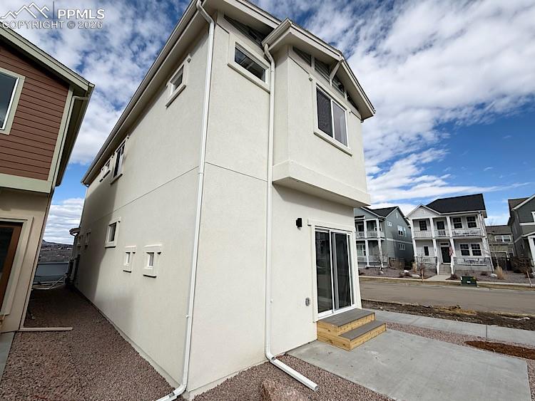 Image 44 of 48: Back and side of home. Please, excuse our dust as this home is currently un