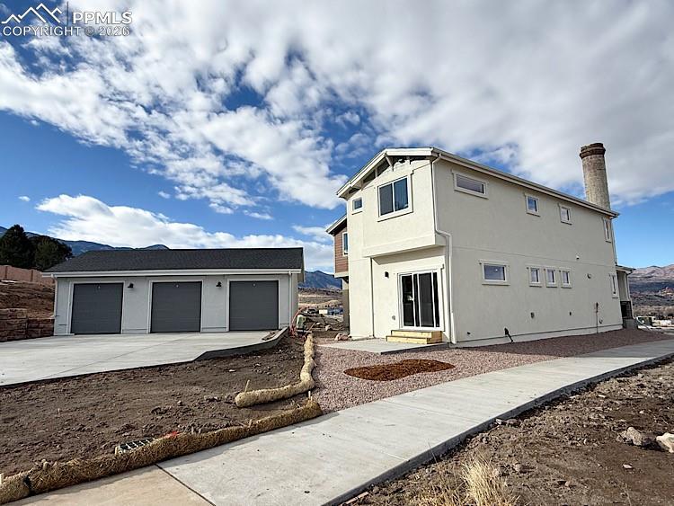 Image 45 of 48: Back of home. Please, excuse our dust as this home is currently under const