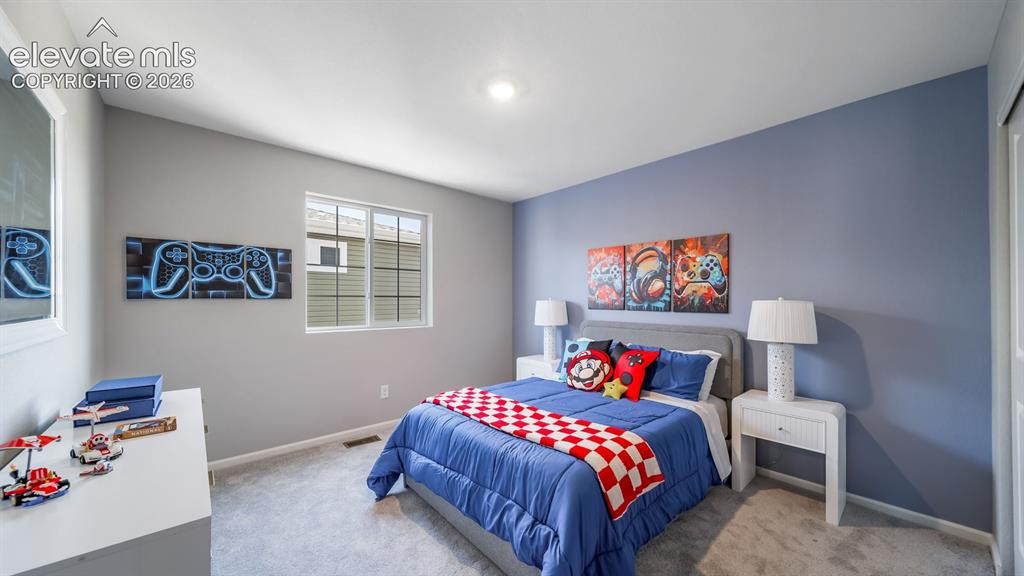 Image 8 of 39: Bedroom
Photos of a model home