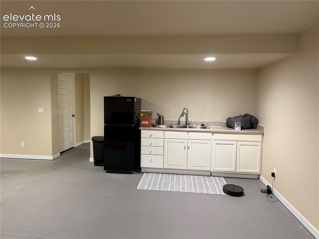 Image 22 of 31: Basement wetbar