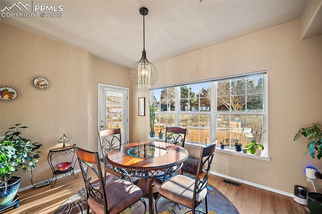 Image 14 of 49: Walk out to the extra-large patio. 