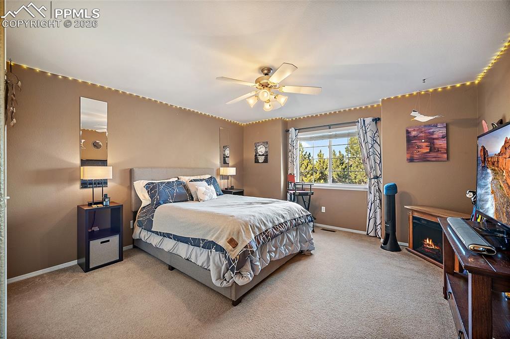 Image 24 of 50: Suite 1 with adjoining bathroom -Upper-level bedroom