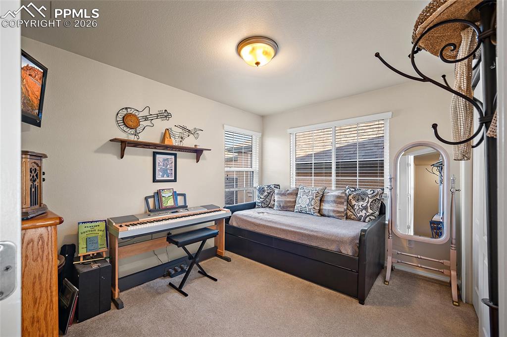 Image 32 of 49: Bedroom 3 on upper level. 