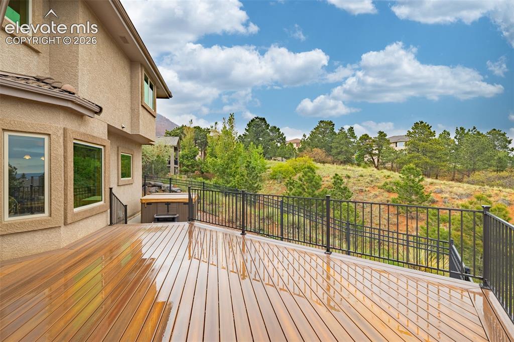 Image 3 of 43: Large deck on back of home
