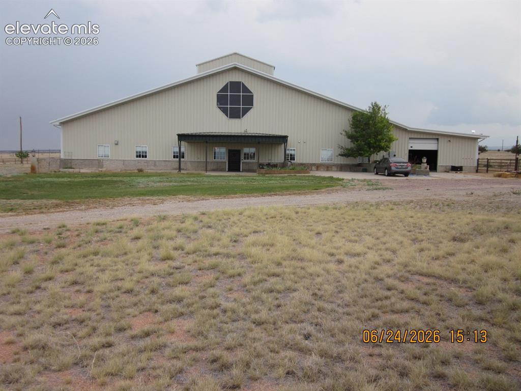 Image 1 of 34: Total square footage of the building is 27,150 sq. ft. The horse stable is