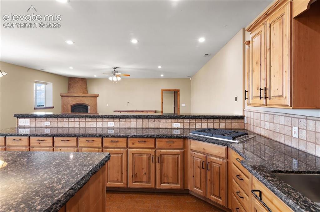 Image 15 of 50: Looking into the living room over the raised breakfast bar
