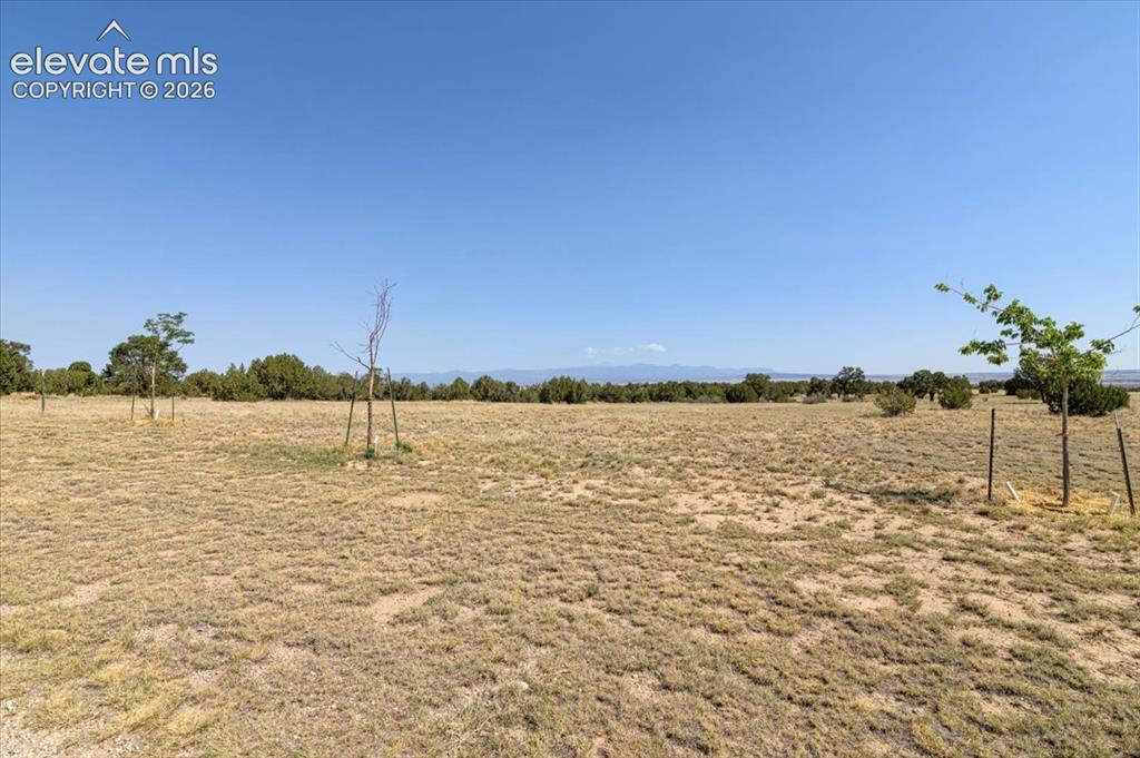 Image 45 of 45: 108 ft. X 230 ft. outdoor arena with mountain view in the backround