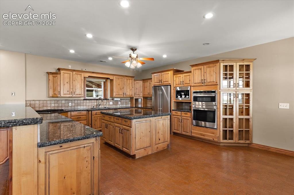 Image 8 of 50: Center island in kitchen measures 4ft. 6 in. X 5 ft.