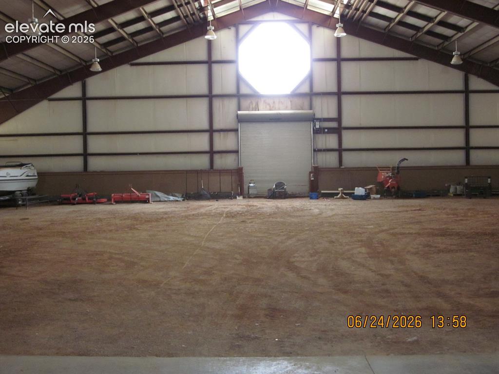 Image 9 of 34: Front covered main entrance patio is 15 ft. x 32 ft. covered plus additiona