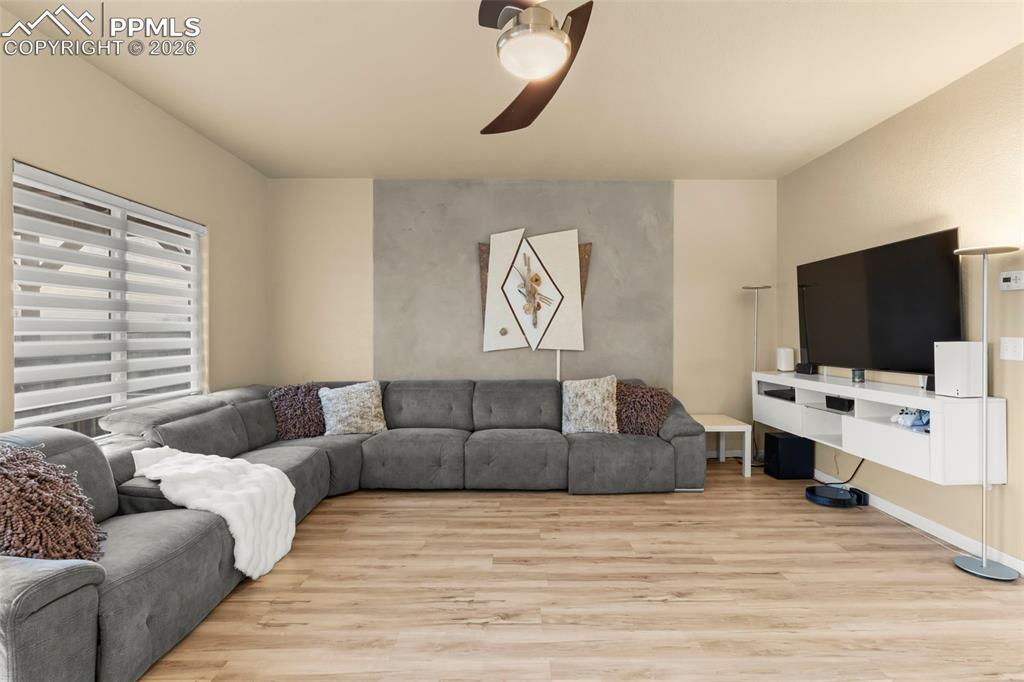 Image 11 of 50: Foyer featuring light wood finished floors and a high ceiling