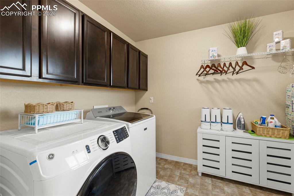 Image 27 of 50: Main floor half bath with digital mirror