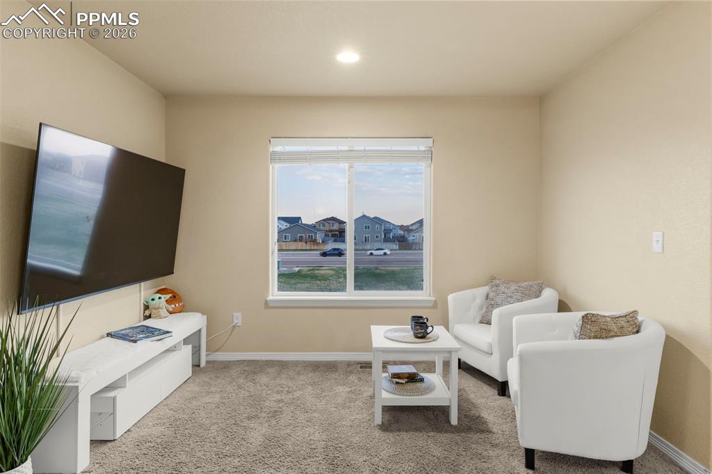 Image 30 of 50: Bedroom 1 with plenty of space, natural light, and a large closet