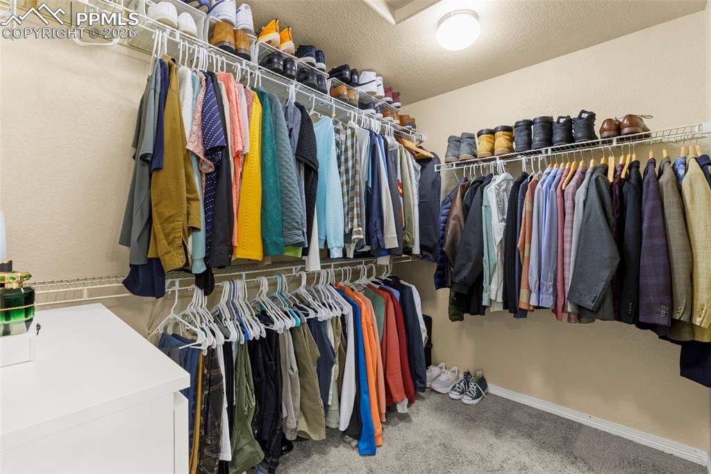 Image 36 of 50: Bedroom 3 with plenty of space, natural light, and a large closet