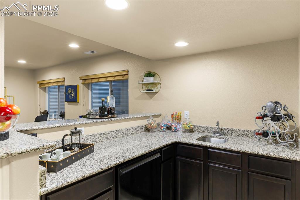 Image 39 of 50: Large primary bedroom with tray ceiling