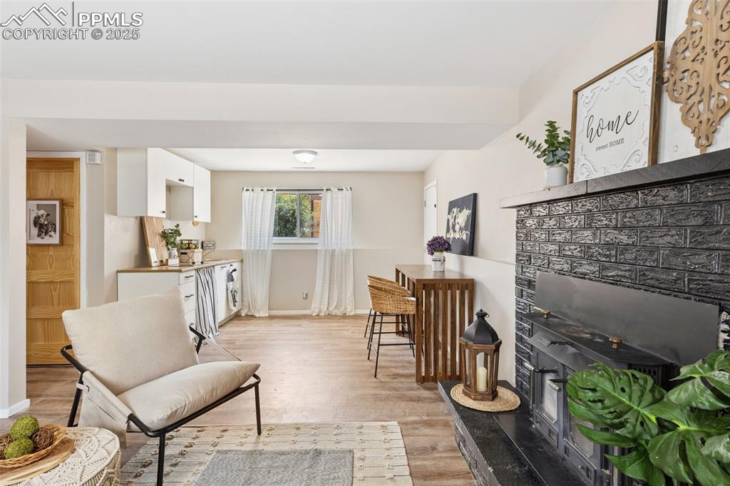 Image 18 of 38: Spacious Family Room with a fireplace.