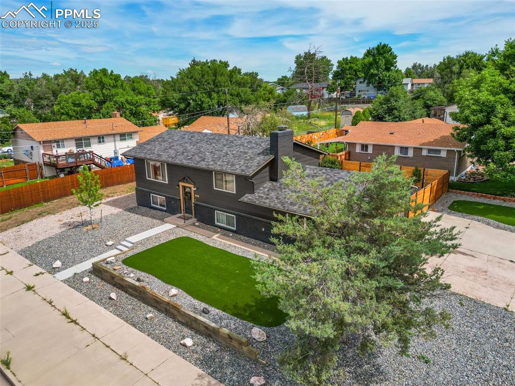 Image 3 of 38: Large corner lot with ample parking.