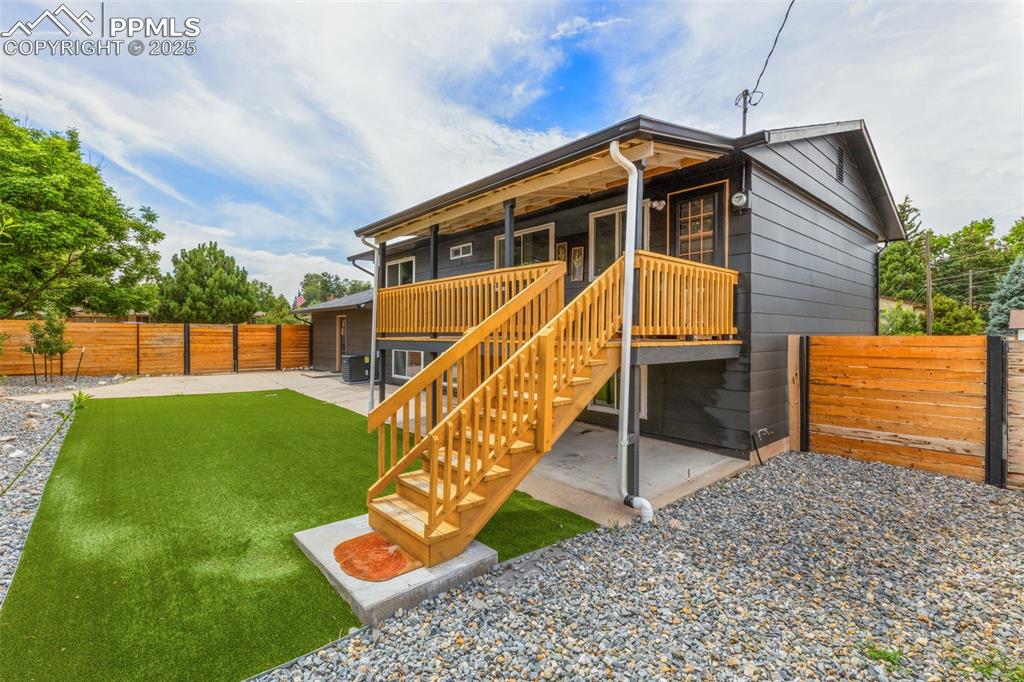 Image 33 of 38: Covered deck/patio.