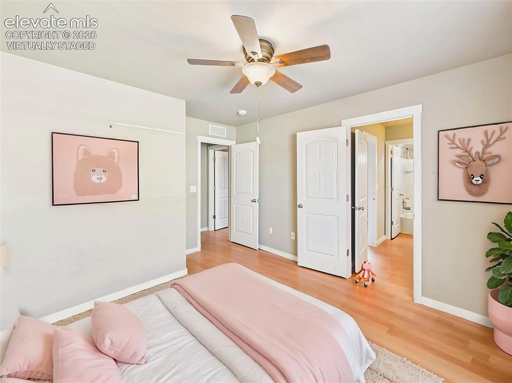 Image 28 of 40: (Virtually Staged) Secondary bedroom highlighting room dimensions and layou