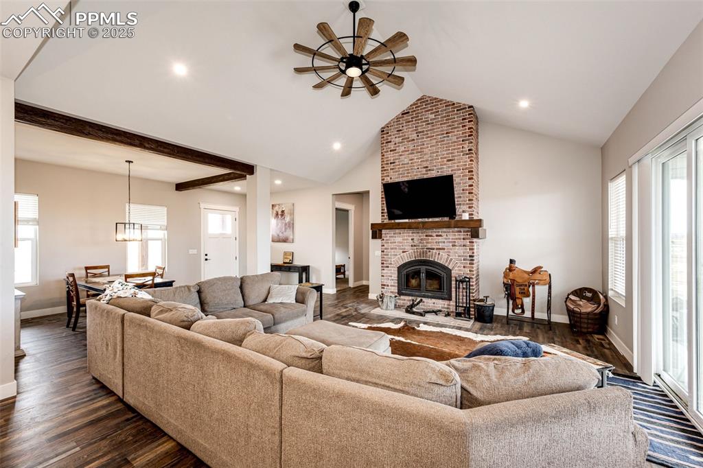 Image 13 of 40: Wood burning Fireplace.