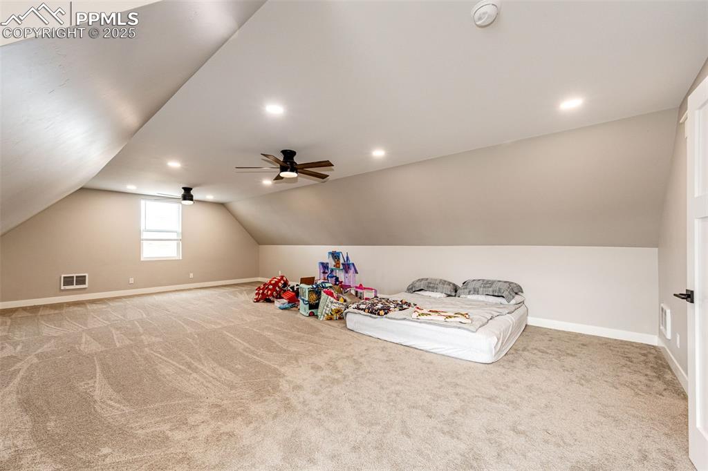 Image 28 of 40: Bonus Room/2nd living room/4th Room.